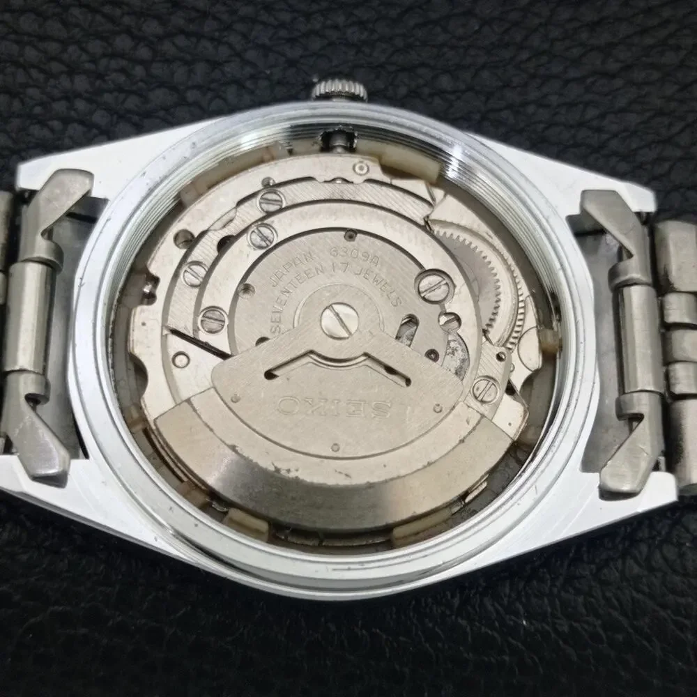 Vintage 1974 Seiko Automatic Mens Silver Watch W/daydate & Green accents